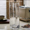 6d5d3a7b-54ef-4f1e-9eb8-928333a7f9c6.jpg Transparent Gold-Painted Glass Vase – Home & Wedding Decoration