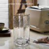 993bf428-b457-48f1-9ae3-41214b6771f8.jpg Transparent Gold-Painted Glass Vase – Home & Wedding Decoration